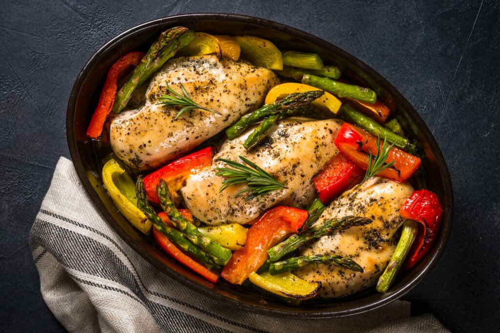 Baked chicken with vegetables top view